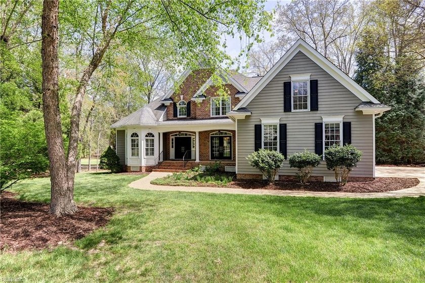 Beautifully sited on prestigious Ford's Colony Drive overlooking - Beach Home for sale in Williamsburg, Virginia on Beachhouse.com