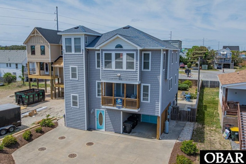 Welcome to Sandy Feet Retreat, a stunning 5-bedroom, 5-bath - Beach Home for sale in Kill Devil Hills, North Carolina on Beachhouse.com