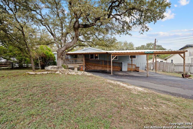 This spacious double-wide manufactured home offers quiet living - Beach Home for sale in Spring Branch, Texas on Beachhouse.com