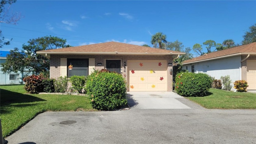 Welcome to this charming villa just minutes from the Gulf - Beach Condo for sale in Bradenton, Florida on Beachhouse.com