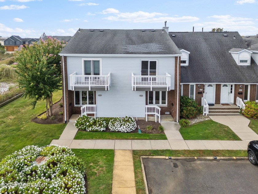 Discover coastal living in this beautiful 2-story townhouse in - Beach Condo for sale in Monmouth Beach, New Jersey on Beachhouse.com