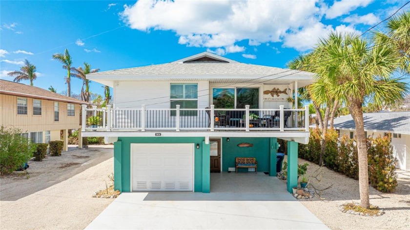 $25,000 PRICE IMPROVEMENT.Elevated half duplex with only minor - Beach Townhome/Townhouse for sale in Holmes Beach, Florida on Beachhouse.com