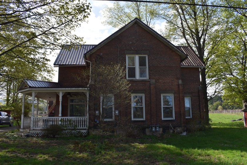 The farmhouse is an old style, brick, 2-story, 3,500 sf home - Beach Home for sale in Portland, New York on Beachhouse.com