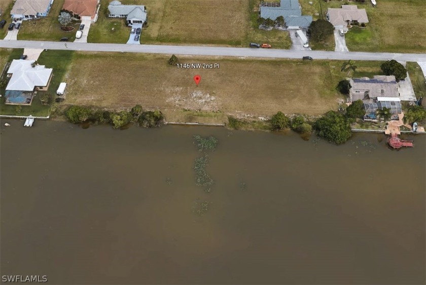 THE ULTIMATE VIEW! Rare LAKE FRONT WEST EXPOSURE fresh water lot - Beach Lot for sale in Cape Coral, Florida on Beachhouse.com