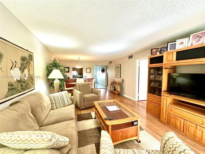 Enjoy relaxing garden  views from your screened in porch. The - Beach Condo for sale in Pembroke Pines, Florida on Beachhouse.com