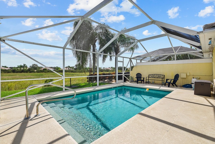 Immaculate villa with a heated, screened-in pool & preserve view - Beach Home for sale in Port Saint Lucie, Florida on Beachhouse.com