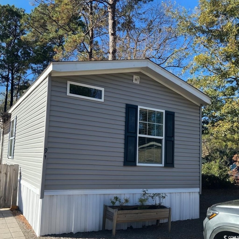 Come and see this Well Done 3-bedroom, 2-bath home that offers a - Beach Home for sale in Murrells Inlet, South Carolina on Beachhouse.com