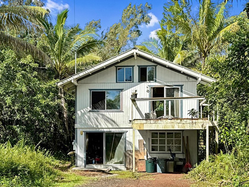 Welcome to this charming redwood and cedar home nestled in the - Beach Home for sale in Pahoa, Hawaii on Beachhouse.com