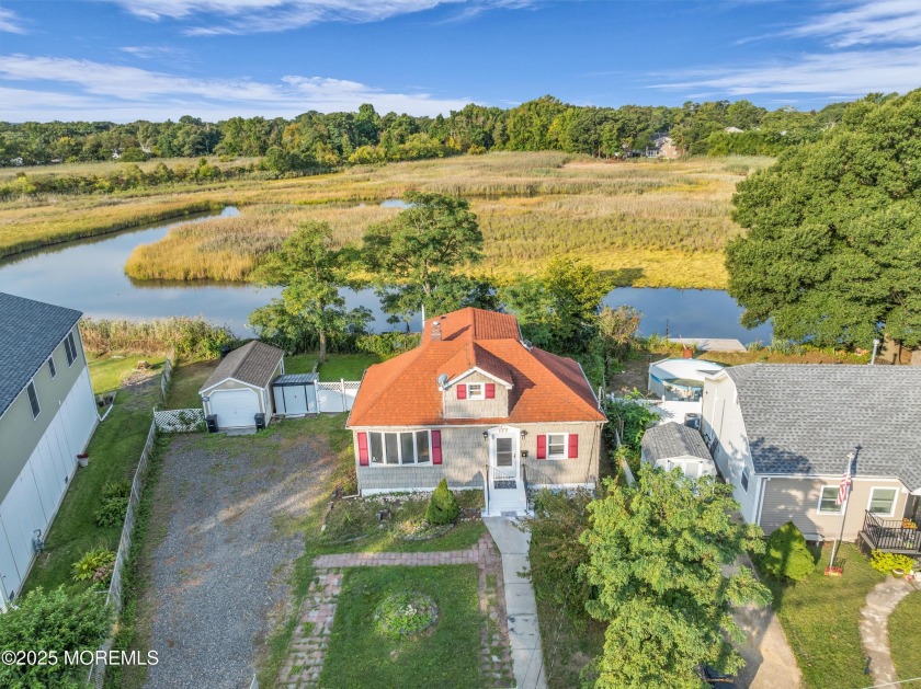 Welcome to waterfront living on Waackaack Creek! A charming - Beach Home for sale in Keansburg, New Jersey on Beachhouse.com