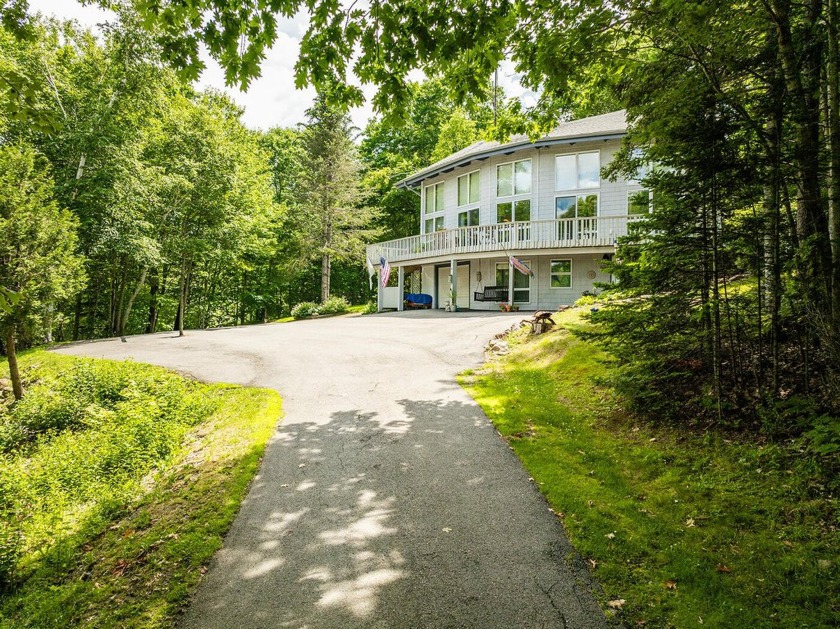 Perched on the scenic side of Caswell Hill, this inviting home - Beach Home for sale in Northport, Maine on Beachhouse.com