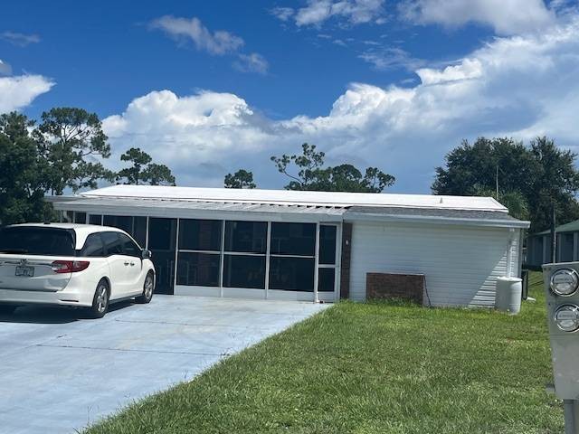 Lovely two-bedroom two bath home with lake views.  This home - Beach Home for sale in North Fort Myers, Florida on Beachhouse.com