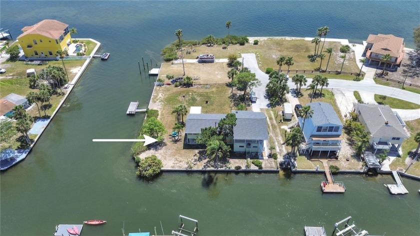 Set on a wide CORNER LOT in Driftwood Isles with a 2024 ROOF - Beach Home for sale in Hudson, Florida on Beachhouse.com