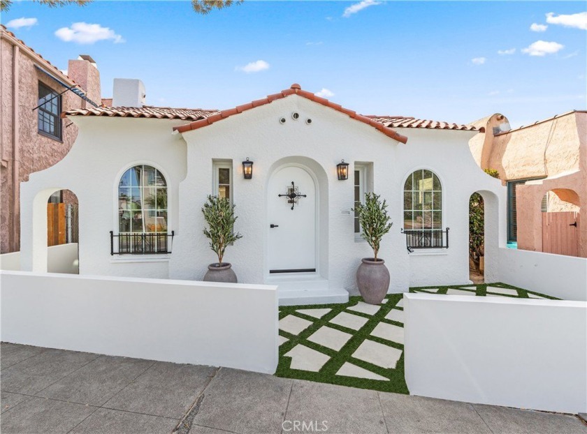 Welcome to this stunningly remodeled Spanish-style home in one - Beach Home for sale in Long Beach, California on Beachhouse.com