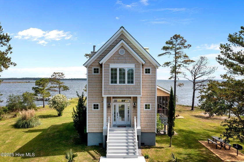 Welcome to 865 Winchester Way! Situated along Ball Creek, this - Beach Home for sale in Merritt, North Carolina on Beachhouse.com