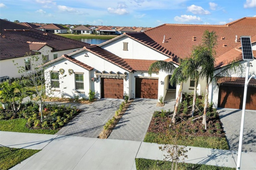 This newly constructed home offers a Double-Gated community with - Beach Townhome/Townhouse for sale in Wimauma, Florida on Beachhouse.com