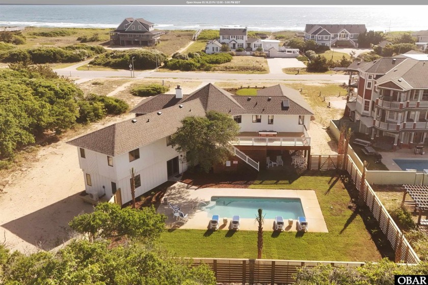 This beautifully renovated 4-bedroom, 4-bathroom semi-oceanfront - Beach Home for sale in Southern Shores, North Carolina on Beachhouse.com