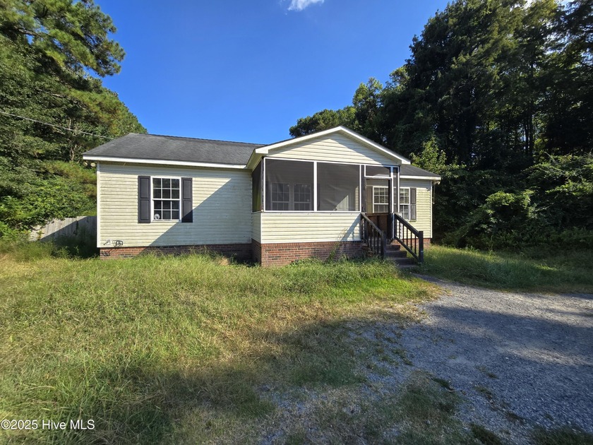 Nestled in a serene natural setting, this 3-bedroom, 2-bathroom - Beach Home for sale in Elizabeth City, North Carolina on Beachhouse.com