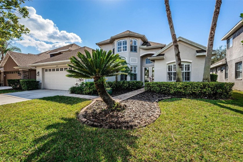 BEAUTIFULLY UPDATED WATERFRONT POOL HOME in GATED MANDOLIN - Beach Home for sale in Tampa, Florida on Beachhouse.com