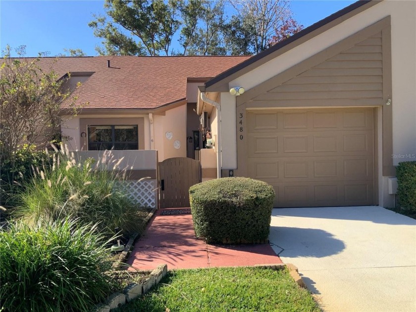 Charming 2-Bedroom Villa with a serene Pond View. Welcome to - Beach Home for sale in Palm Harbor, Florida on Beachhouse.com