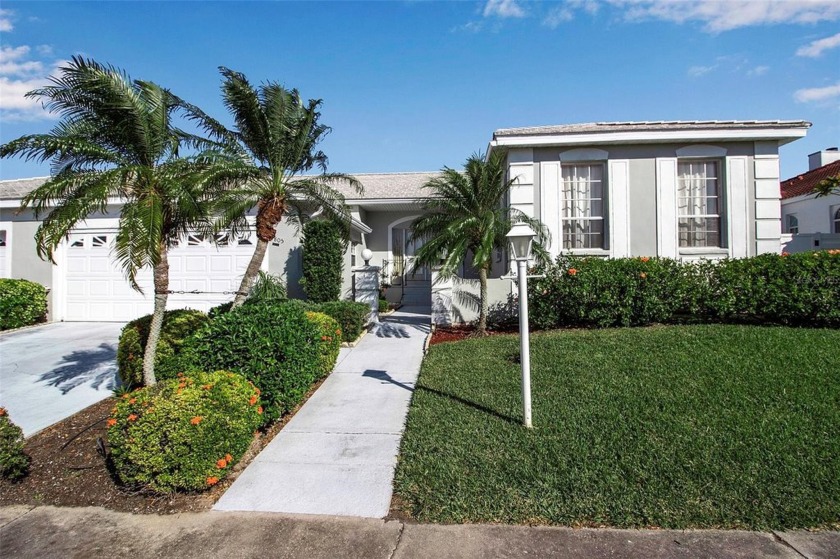 Welcome to Palm Court, a sought-after Mediterranean-style - Beach Condo for sale in Bradenton, Florida on Beachhouse.com