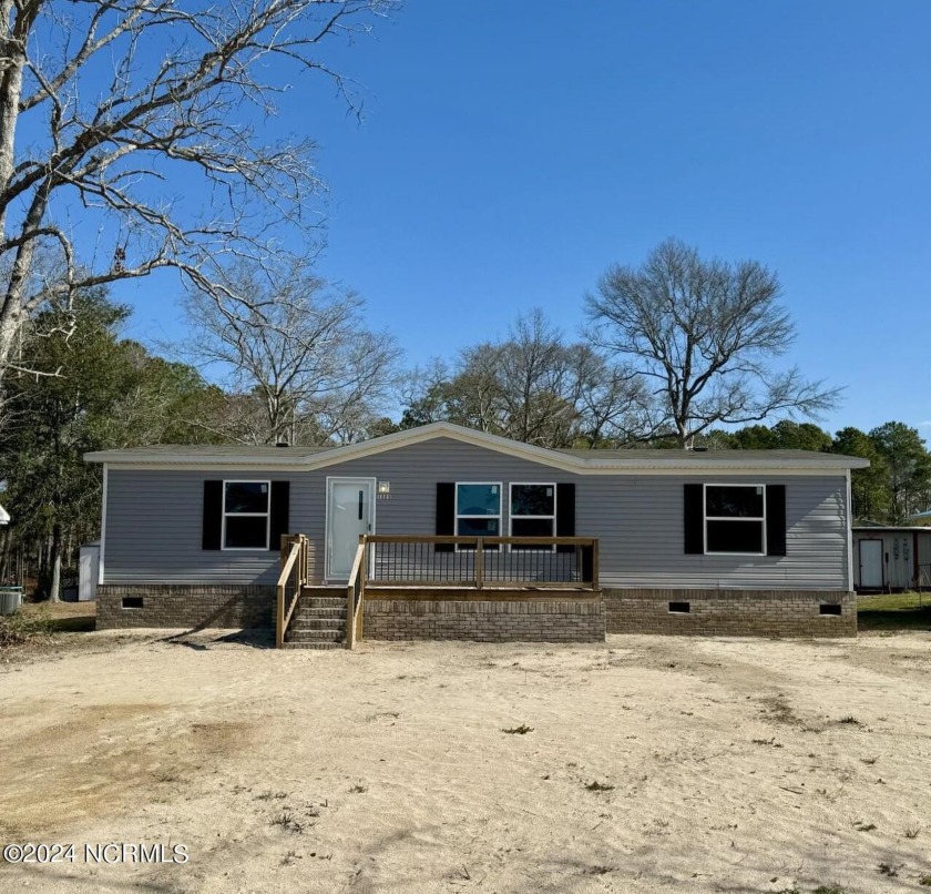 Introducing a never before lived in home in the serene community - Beach Home for sale in Shallotte, North Carolina on Beachhouse.com