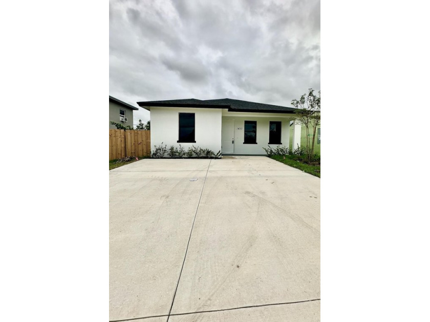 Welcome to your dream home! This brand-new, single-family gem - Beach Home for sale in Riviera Beach, Florida on Beachhouse.com