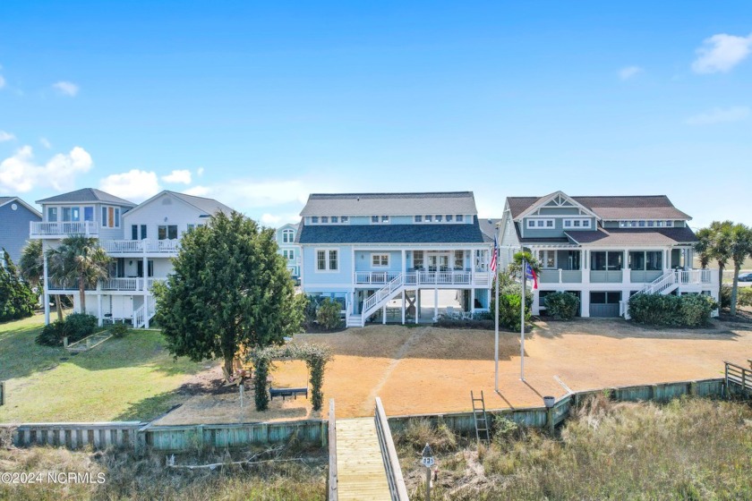 Immerse yourself in the epitome of coastal waterfront living on - Beach Home for sale in Holden Beach, North Carolina on Beachhouse.com