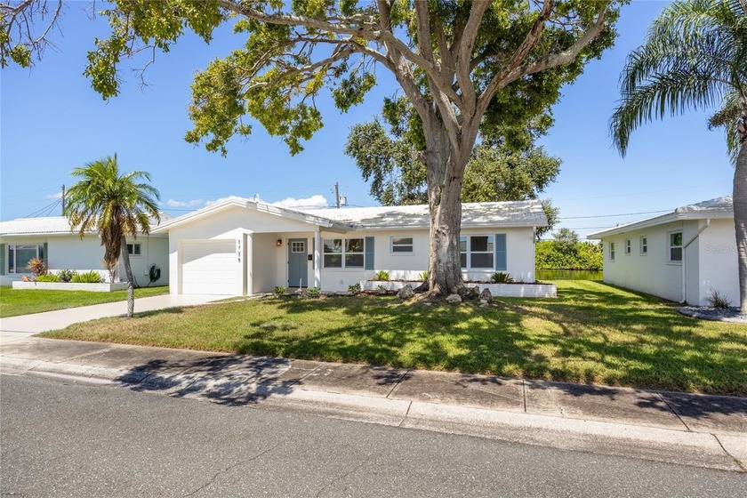 FULLY RENOVATED LAKEFRONT PARADISE IN THE MAINLANDS GOLF - Beach Home for sale in Pinellas Park, Florida on Beachhouse.com