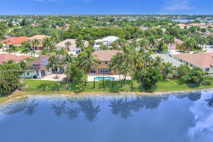 Stunning Estate on the big sparkling blue lakes, in a resort - Beach Home for sale in Miramar, Florida on Beachhouse.com