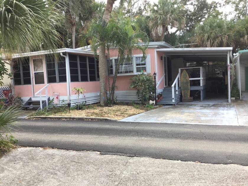 This double wide 2-bedroom, 2-bath home is in a quiet 55+ - Beach Home for sale in Cape Canaveral, Florida on Beachhouse.com