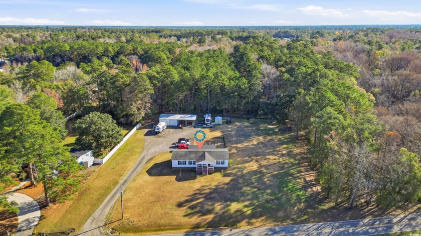 Show-Stopping Myrtle Beach Retreat on 3+ Acres | No HOA  This is - Beach Home for sale in Myrtle Beach, South Carolina on Beachhouse.com