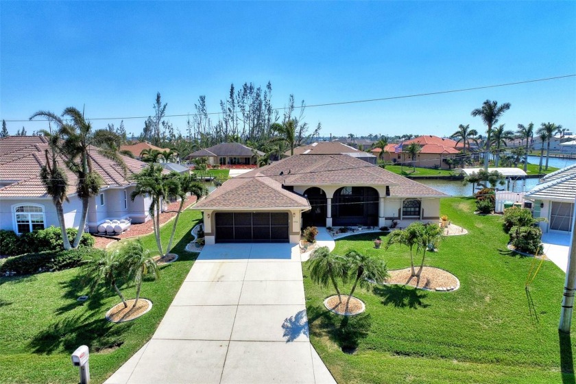 Water you waiting for? Come check out this BEAUTIFUL waterfront - Beach Home for sale in Port Charlotte, Florida on Beachhouse.com