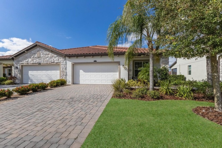 WATERFRONT VILLA IN HIGHLY SOUGHT AFTER ARBOR GRANDE IN LAKEWOOD - Beach Home for sale in Lakewood Ranch, Florida on Beachhouse.com