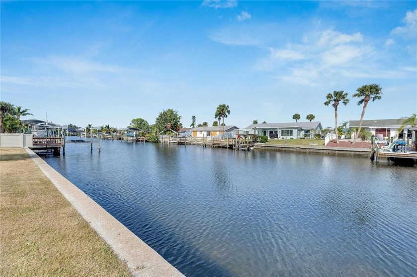 This waterfront home in Apollo Beach on a deep canal with quick - Beach Home for sale in Apollo Beach, Florida on Beachhouse.com