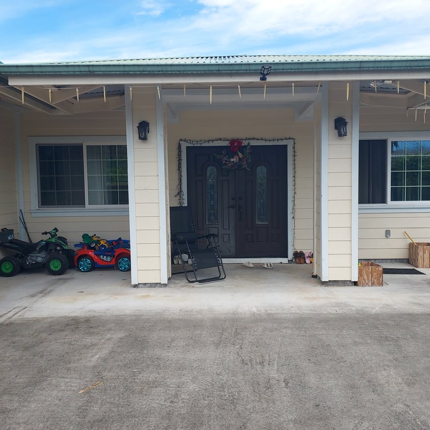 AN IMPRESSIVE ENTRY THROUGH THE BEAUTIFUL BROWN DOUBLE DOORS - Beach Home for sale in Kurtistown, Hawaii on Beachhouse.com