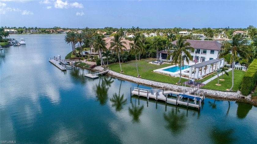 Boaters Paradise....Rare 188 ft. of water-frontage. This gated - Beach Home for sale in Naples, Florida on Beachhouse.com
