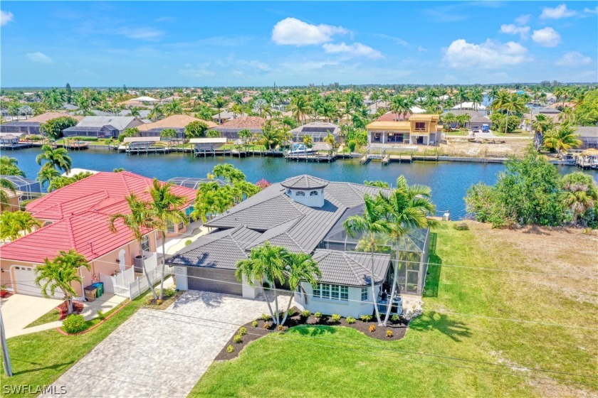 Play video. SELLERS MOTIVATED! 3 bedroom + Den + Cottage. Enjoy - Beach Home for sale in Cape Coral, Florida on Beachhouse.com