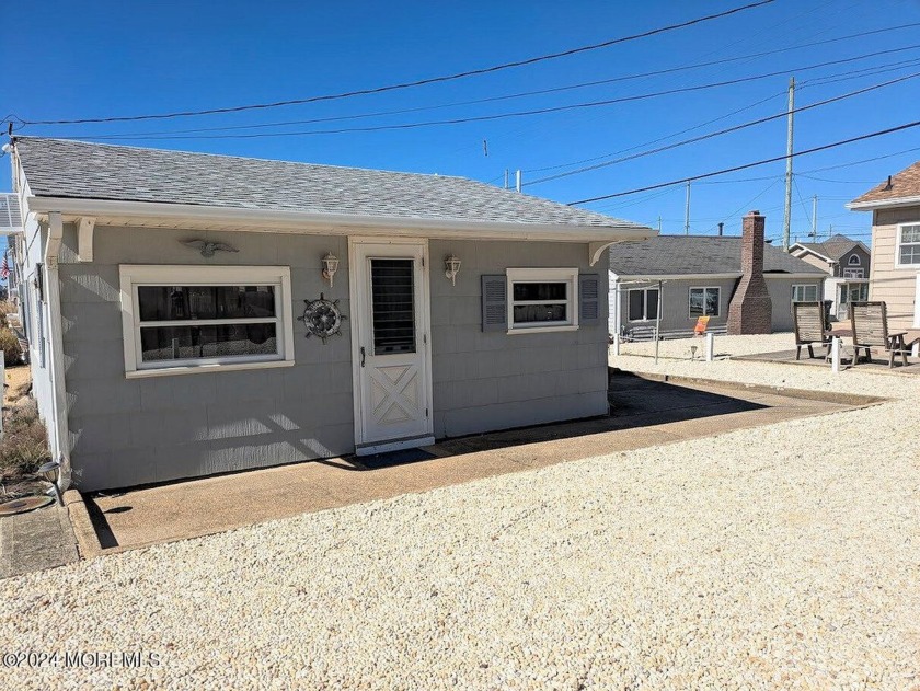 This beach cottage is only FOUR houses from a private beach and - Beach Home for sale in Lavallette, New Jersey on Beachhouse.com