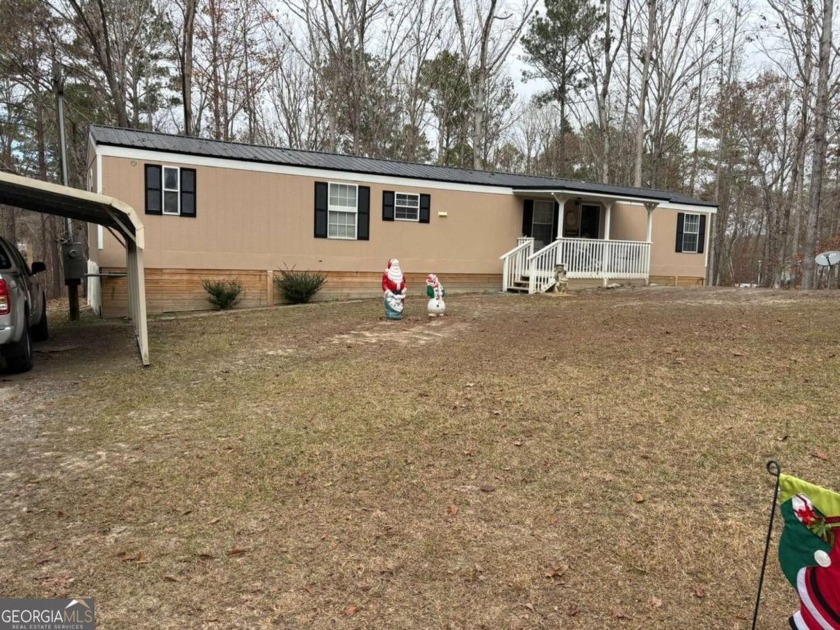 2 bedroom, 2 bath mobile home being sold as is. The lot backs up - Beach Home for sale in Eatonton, Georgia on Beachhouse.com