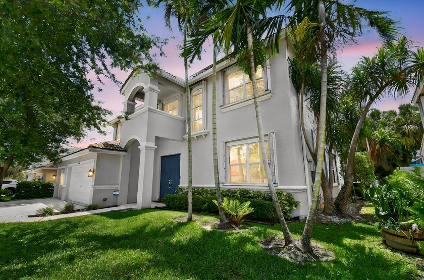 Set within the highly sought-after gated golf community of - Beach Home for sale in Lake Worth, Florida on Beachhouse.com