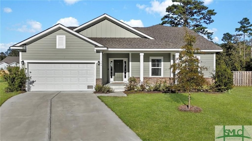 This beautiful, open-concept 5-bedroom, 3-bath home is ready for - Beach Home for sale in Richmond Hill, Georgia on Beachhouse.com