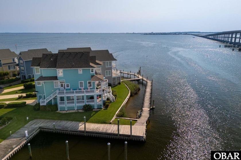 The picturesque views of 61 Sailfish Ct. are in a league of - Beach Home for sale in Manteo, North Carolina on Beachhouse.com