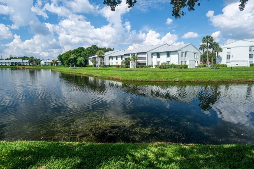 Updated ground floor corner lake front unit right next to the - Beach Condo for sale in West Palm Beach, Florida on Beachhouse.com