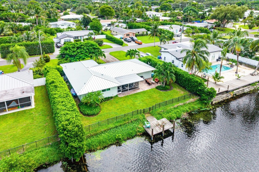 Situated on a large, almost 11,000 sf waterfront lot, this - Beach Home for sale in Boynton Beach, Florida on Beachhouse.com