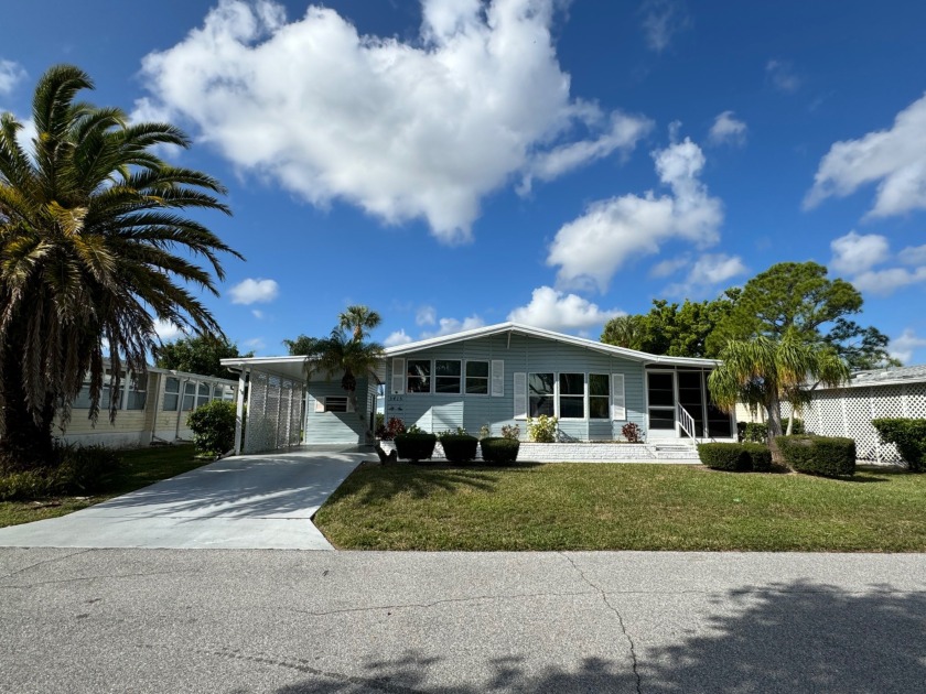 THIS HOME IS ON LEASED LAND WITH AN APPROXIMATE MONTHLY LOT - Beach Home for sale in Sarasota, Florida on Beachhouse.com