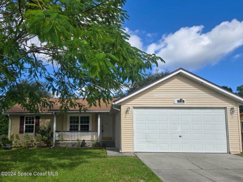 REDUCED! Discover this charming home, ideal for first-time - Beach Home for sale in Titusville, Florida on Beachhouse.com