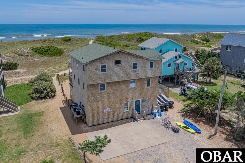 Ready to truly get A Wave From It All? This classic oceanfront - Beach Home for sale in Waves, North Carolina on Beachhouse.com