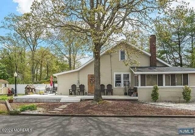 Charming 3-bedroom home nestled on a beautifully landscaped lot - Beach Home for sale in Toms River, New Jersey on Beachhouse.com