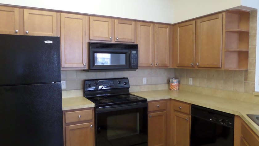 LARGE FIRST FLOOR ONE BEDROOM FACING THE COURTYARD. OPEN KITCHEN - Beach Condo for sale in West Palm Beach, Florida on Beachhouse.com