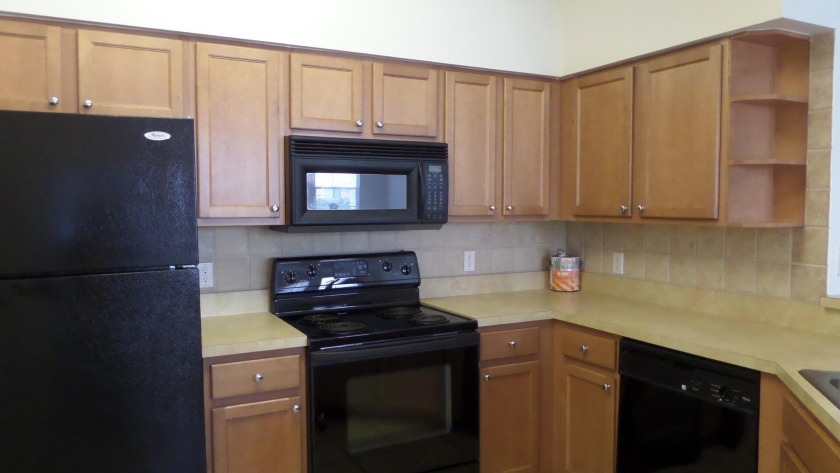 LARGE FIRST FLOOR ONE BEDROOM FACING THE COURTYARD. OPEN KITCHEN - Beach Condo for sale in West Palm Beach, Florida on Beachhouse.com